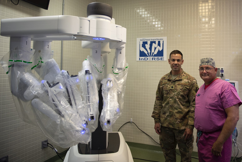 Pictured is a surgical robot that is used to perform complex operations, using robotic guidance.