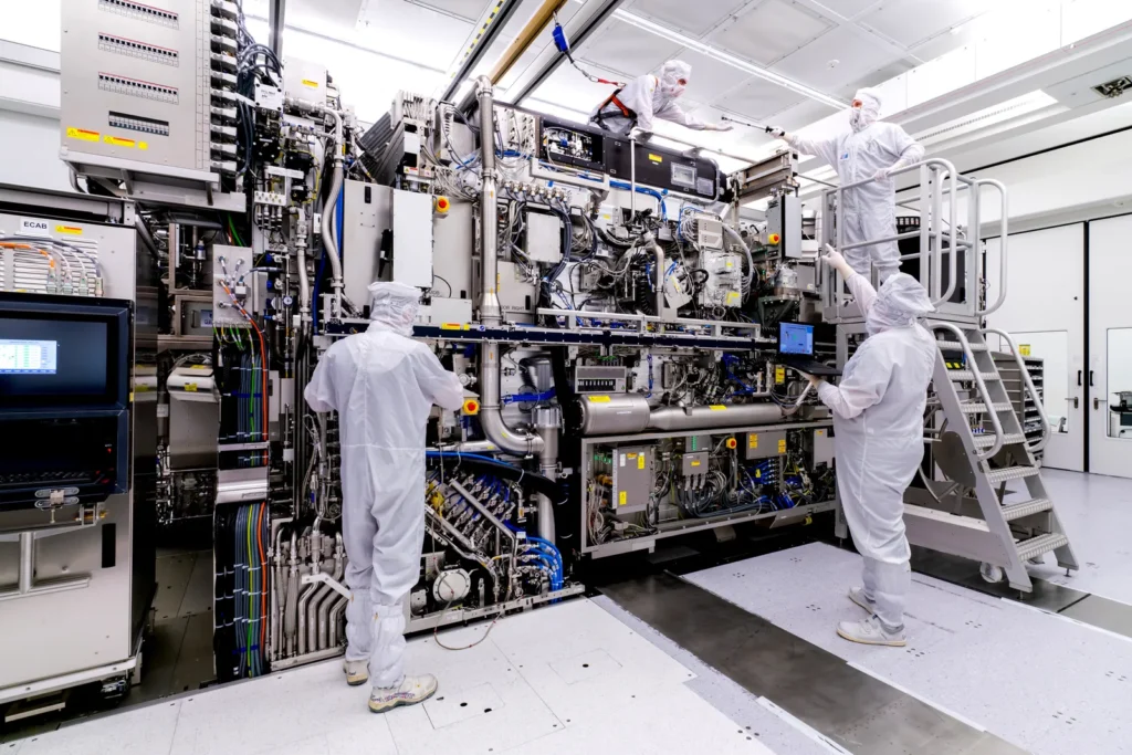 Image of ASML's expansive EUV lithography setup in a large room, a high-value equipment worth over $150 million, used in advanced semiconductor manufacturing.