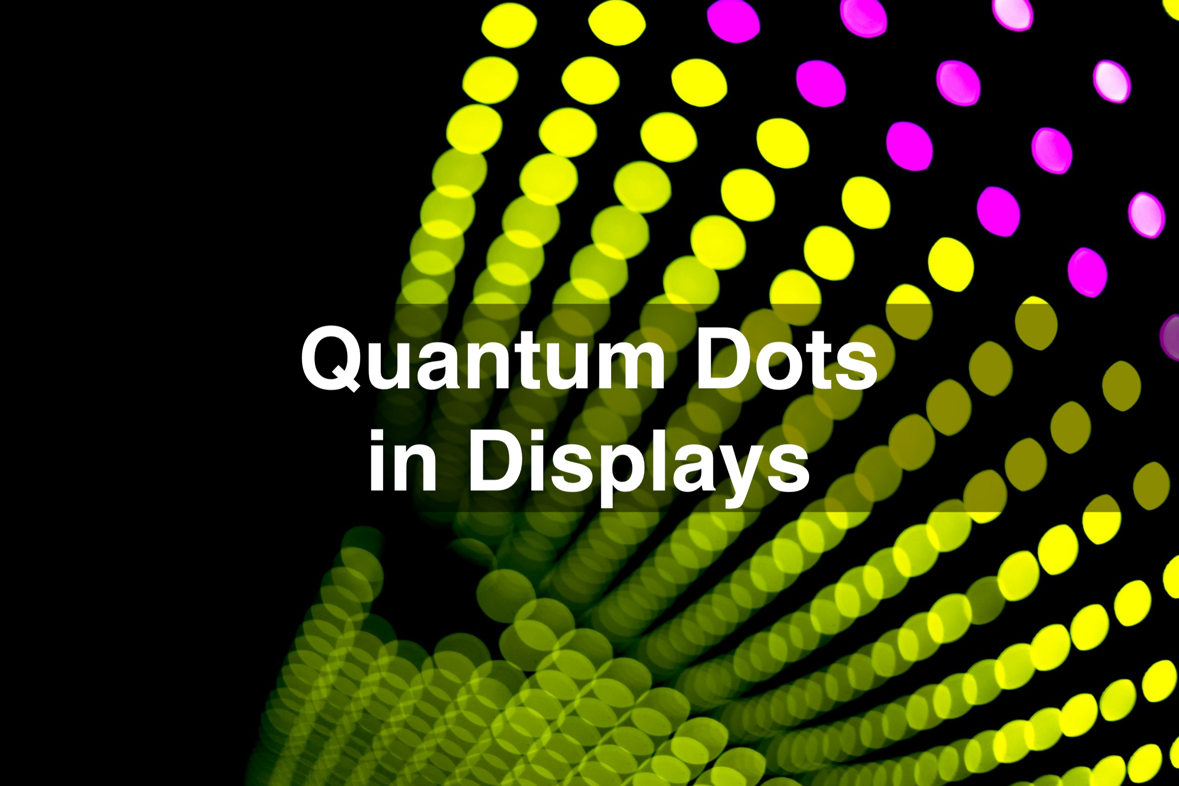 Colorful quantum dots in displays on a black background representing nanoscale semiconductor particles used in modern screen technology.
